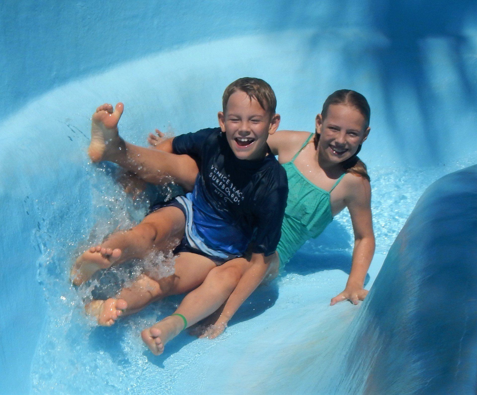 Family having fun at water slide