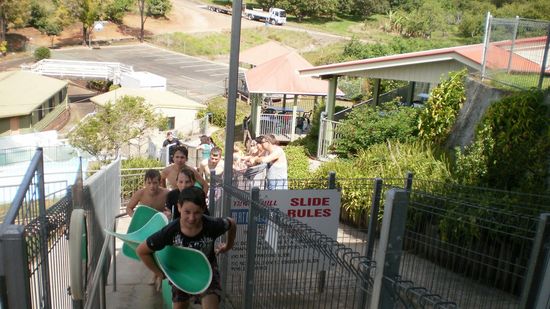 Adult sliding at a dynamic hydro slipslide