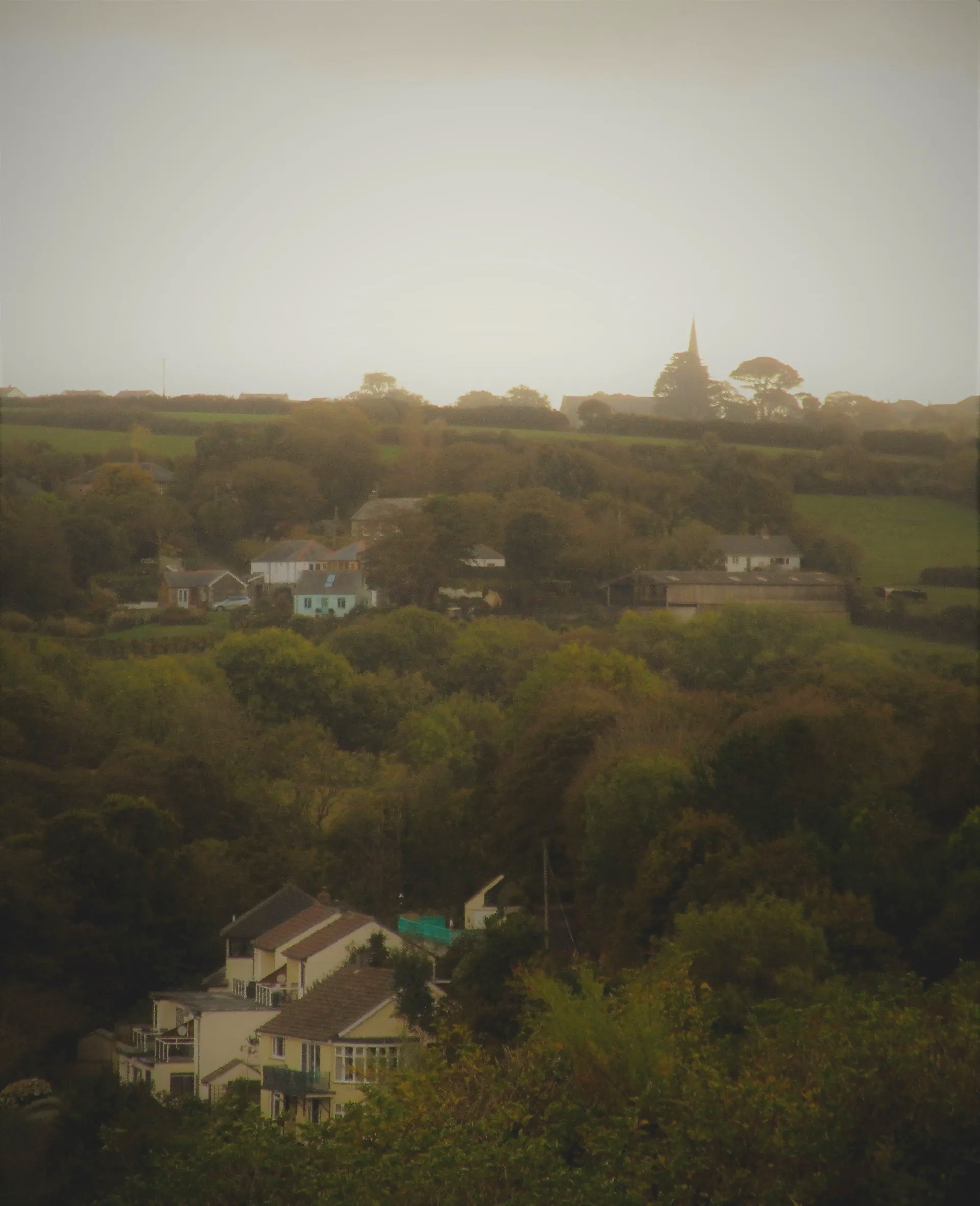 Gallen-Treath as seen from the South West Coastpath with St Keverne in the distance