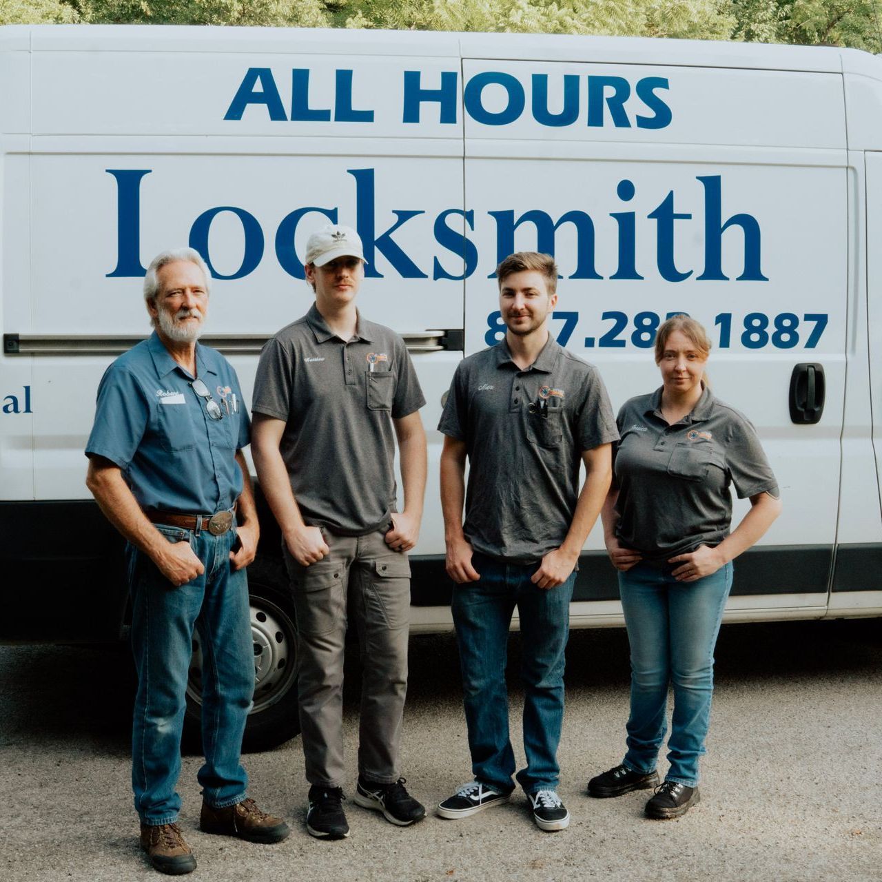 A close up of a person 's hand holding a door handle.