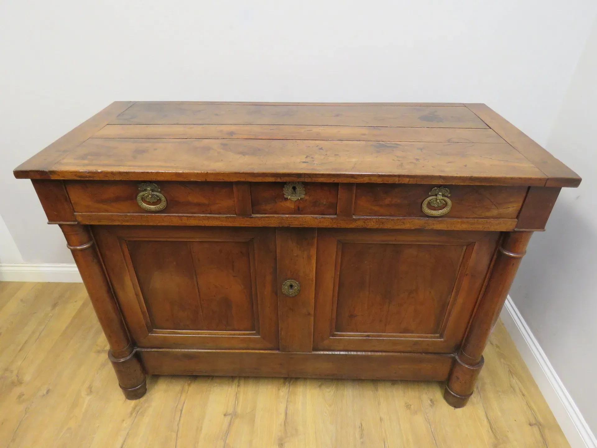 A fine quality Early 19th century French Walnut 2 Door Side Cabinet complete with original fittings and having excellent patination. 1