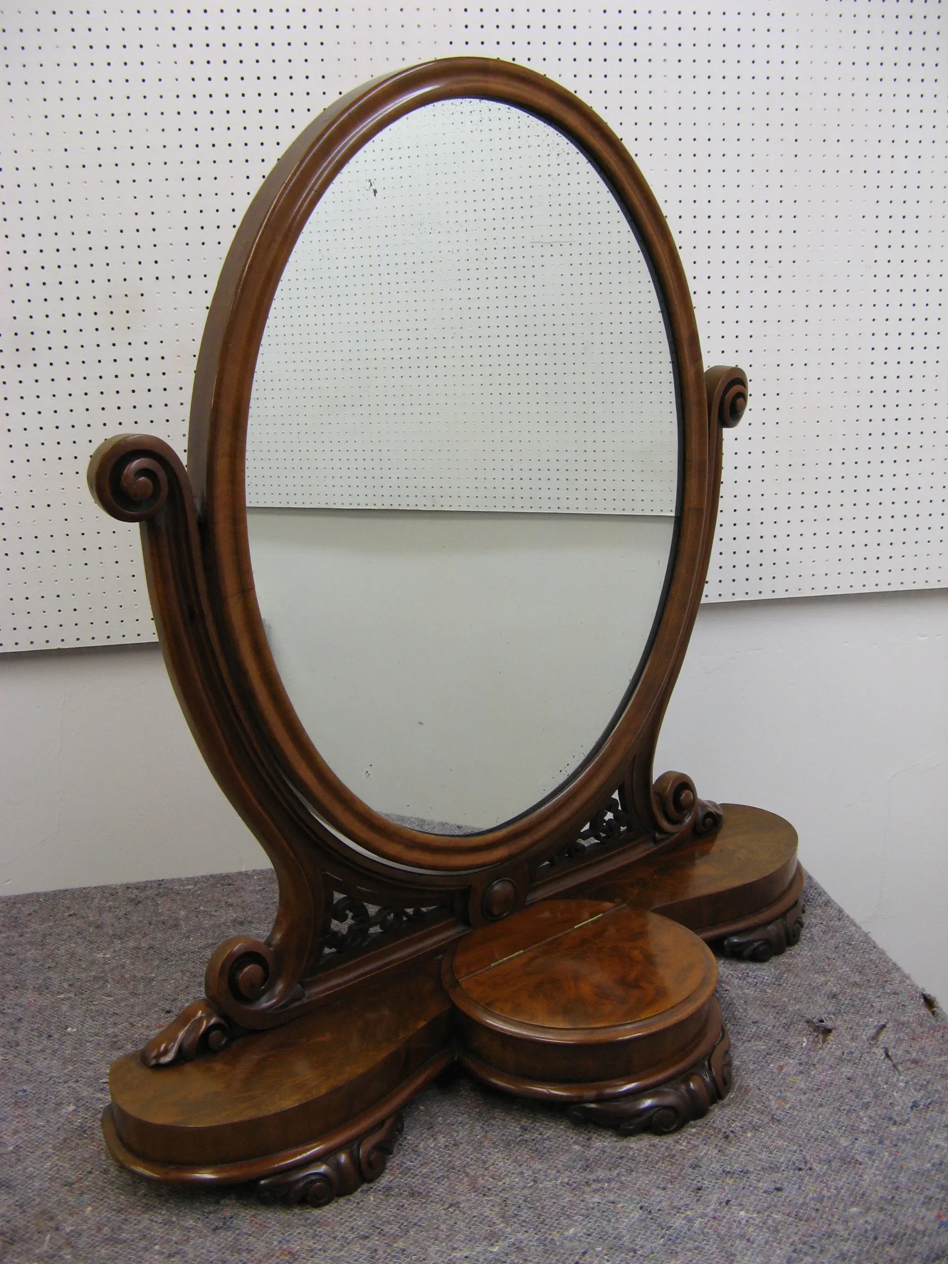 A mid Victorian mahogany dressing mirror. £380.00. 34”tall x 32” wide. 1