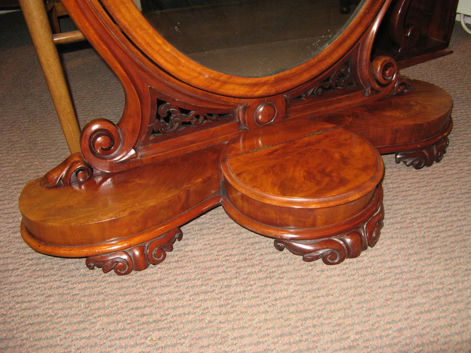 A mid Victorian mahogany dressing mirror. £380.00. 34”tall x 32” wide. 2