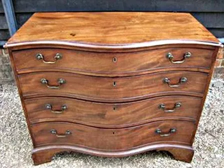 SERPENTINE MAHOGANY CHEST 4