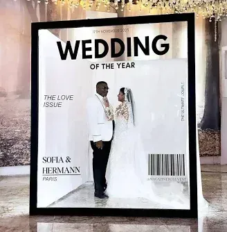 A bride and groom are on the cover of a wedding magazine.