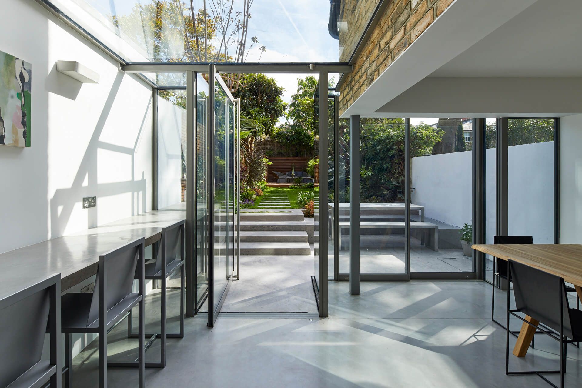 landscape-house-lower-ground-floor-basement-lgf-refurbishment-glass-box-extension-listed-house-building-polished-concrete-tredegar-square