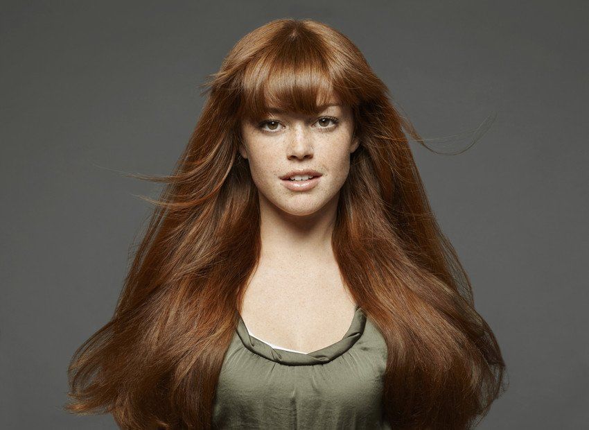 portrait of young woman with long brown hair