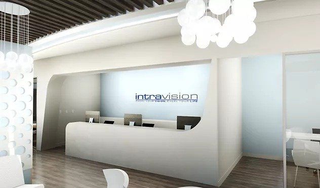 A reception area with a sign that says intravision