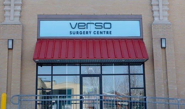 A building with a red awning that says verso surgery centre