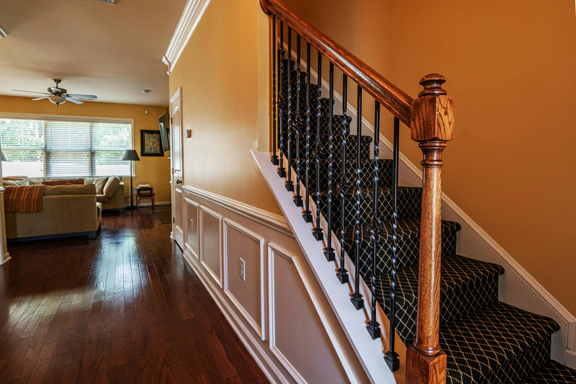 A staircase leading up to the second floor of a house