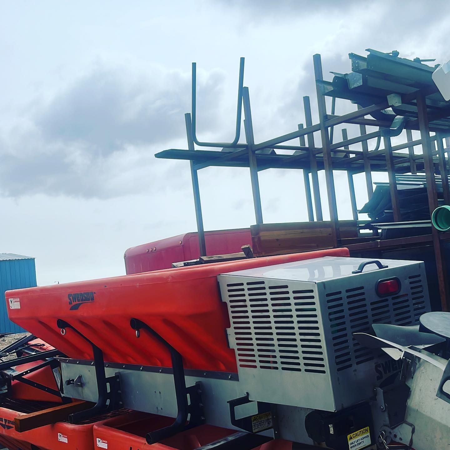 A large orange machine with the word simpson on it