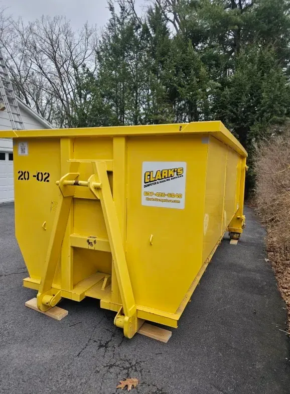 Yellow dumpster labeled