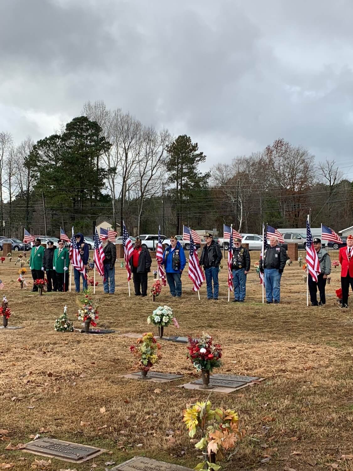 Veterans Lining Up and Holding Flags in Jefferson Memorial Gardens