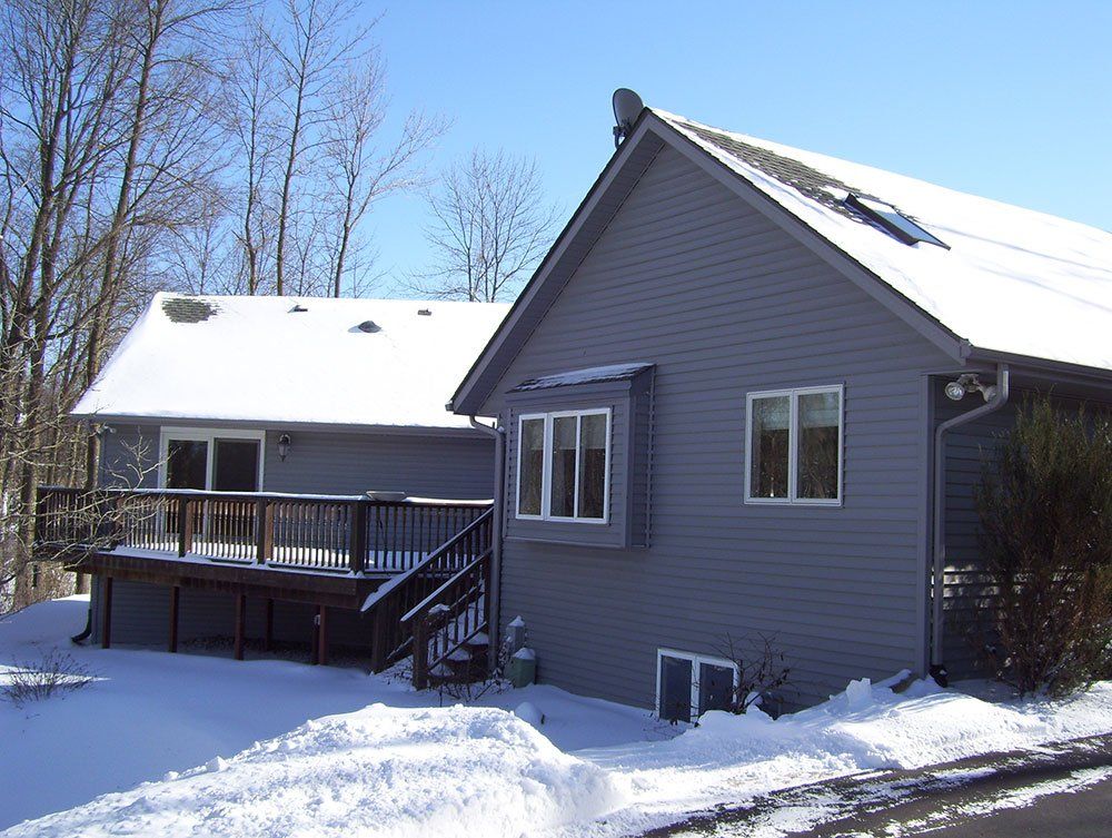 Roof Covered With Snow — Newburg, WI — Laubenstein Inc