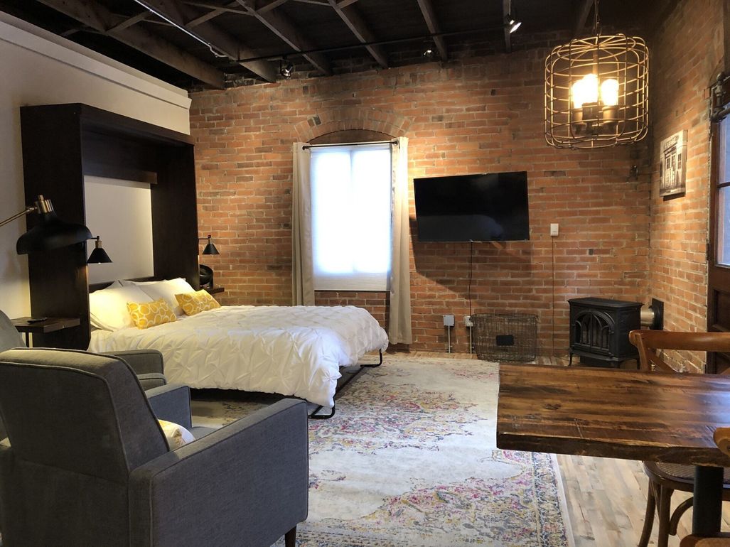 bedroom with exposed brick