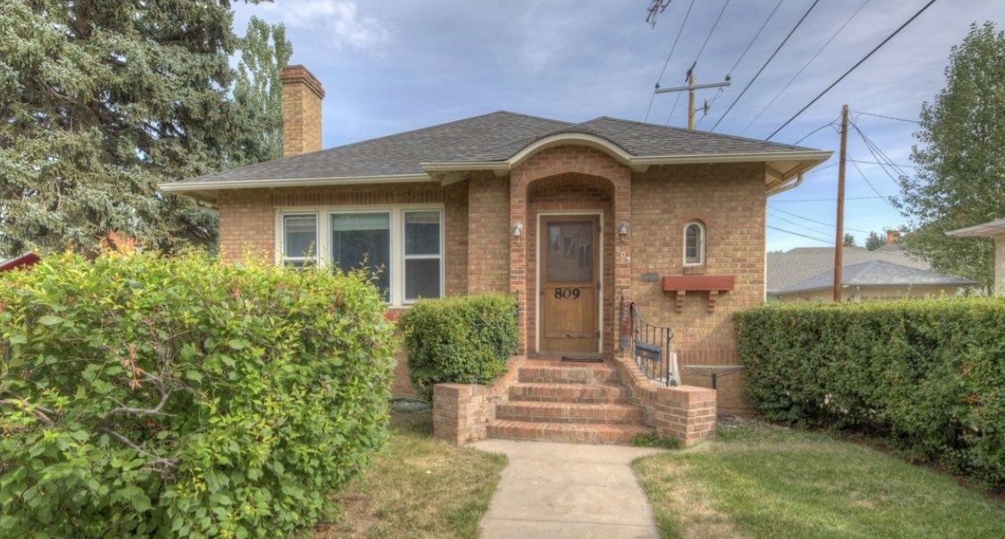 small red brick home