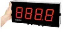 Hand holding a black digital display with red 7-segment numbers reading 8888
