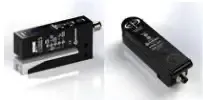 Black electronic control module shown from two angles on a white background