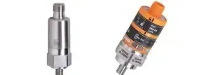 Two small industrial sensors, one silver and one silver with orange top and black bands, side by side