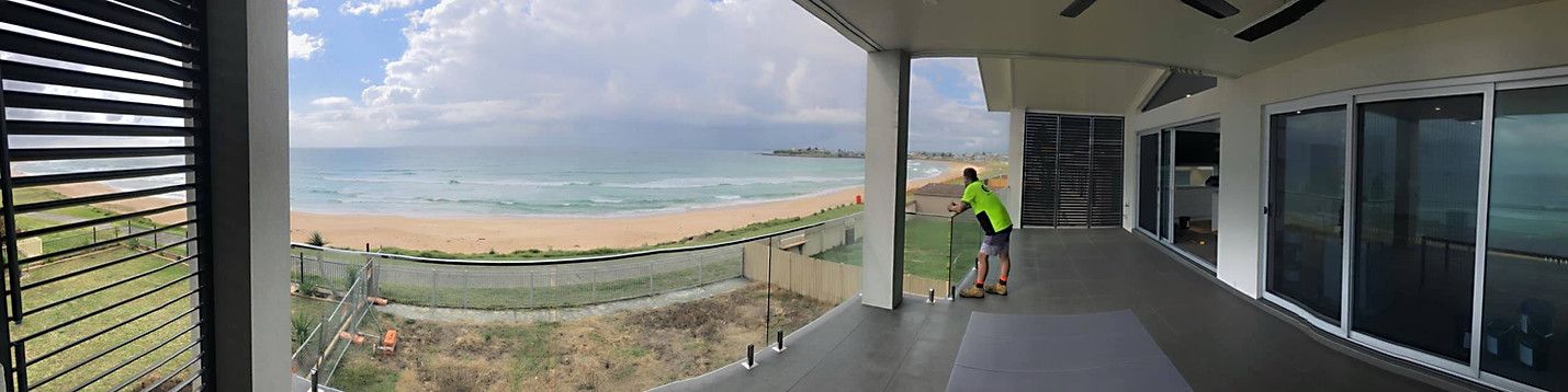 panoramic shot from coastal home balcony