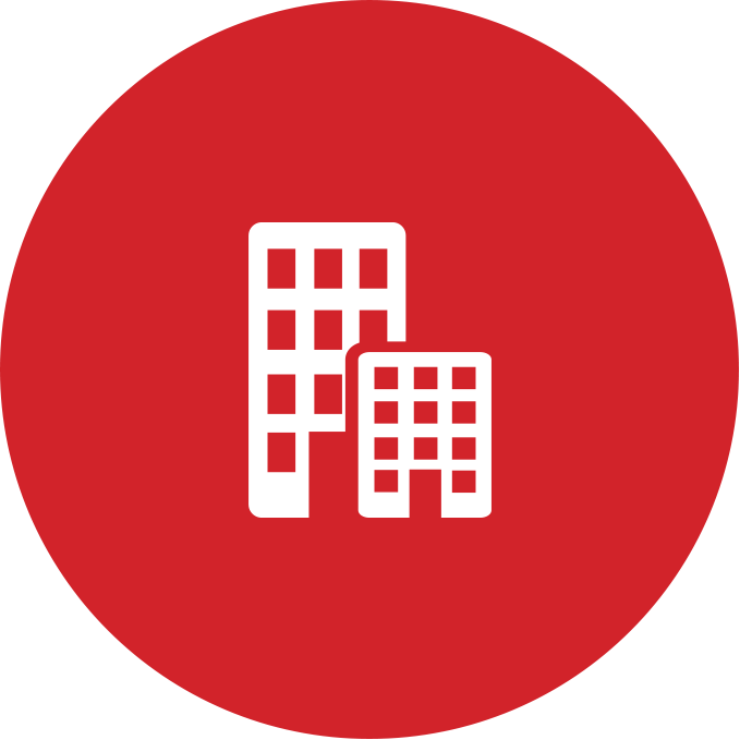 A white icon of two buildings in a red circle.