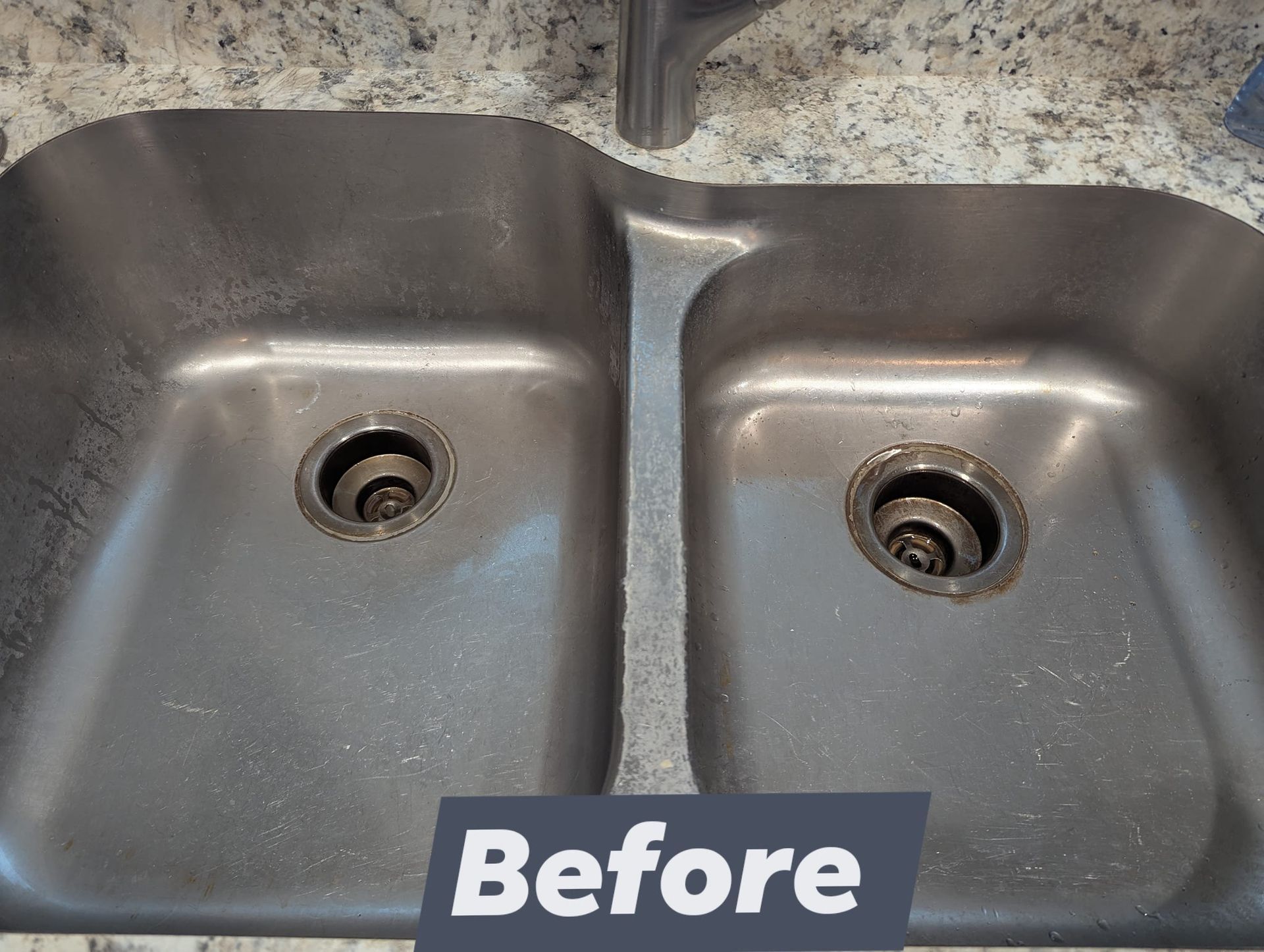 Stainless steel double sink before cleaning with visible stains.