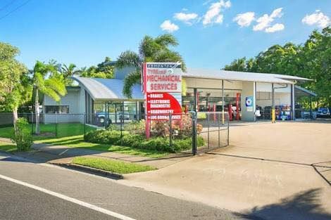Auto Repair Shop With Sign, Building, and Trees — Edmonton Tyre and Mechanical Services in Edmonton, QLD