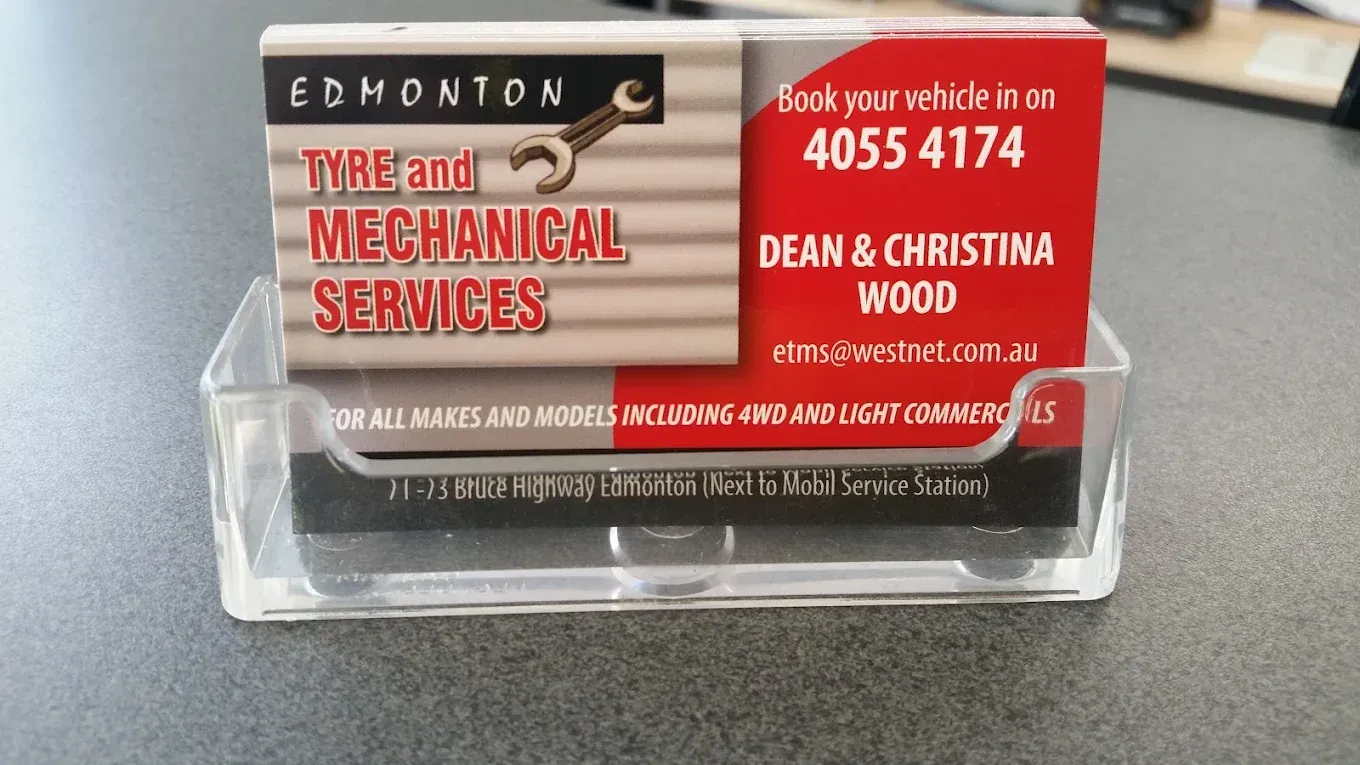 Mechanic Aligns Car Tyre Using Alignment Tools at a Service Station — Edmonton Tyre and Mechanical Services in Edmonton, QLD