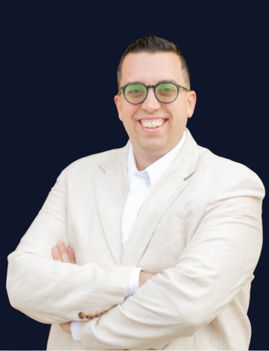 anthony miller man wearing glasses in white shirt