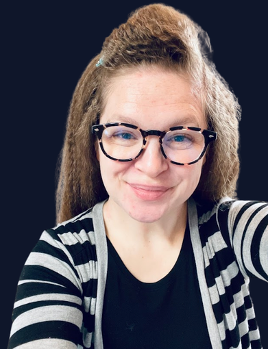 danielle miller woman in glasses in grey shirt