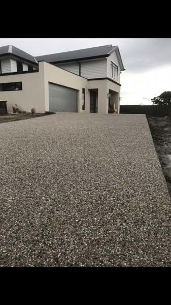 concrete driveway at large home