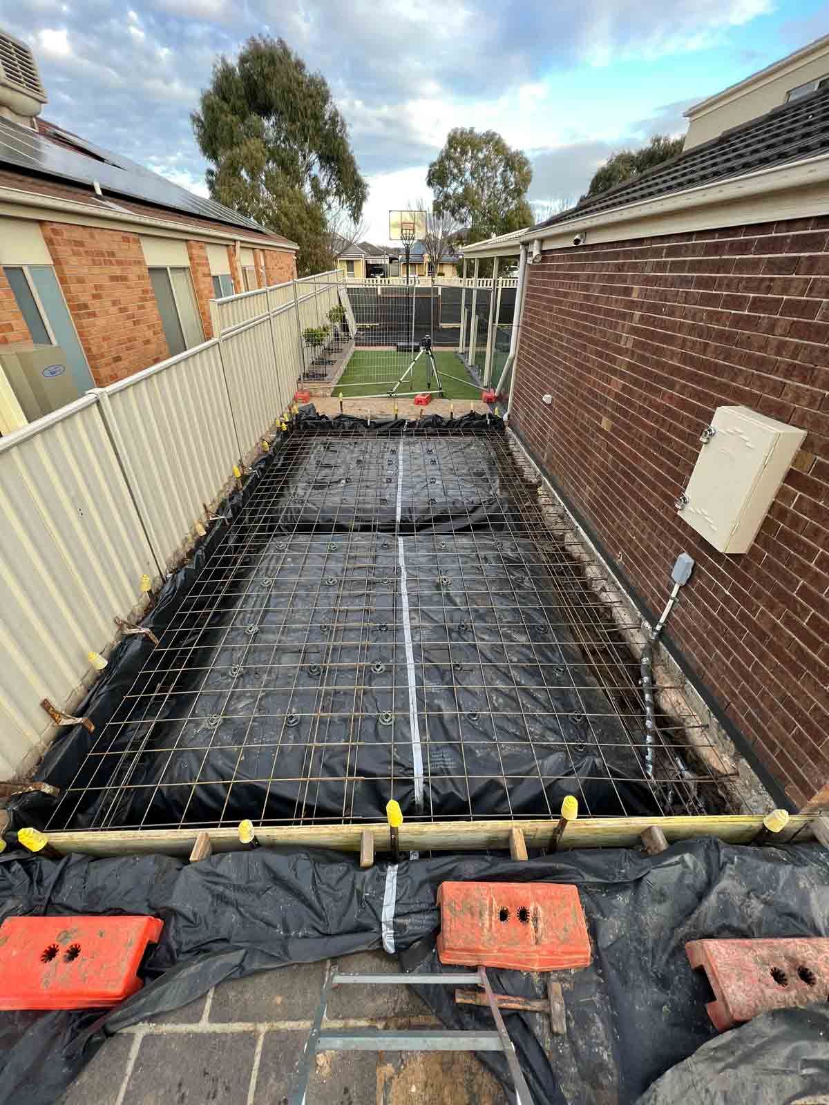 Under construction in the backyard of a house