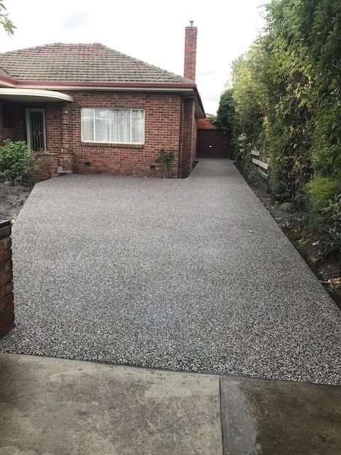 Brick House Concrete Driveway
