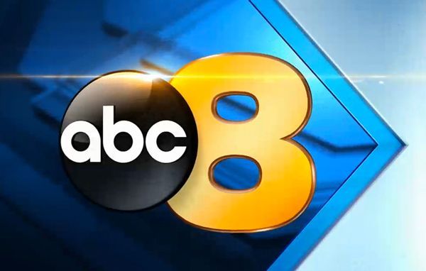 The logo for abc 8 wric is blue and gold