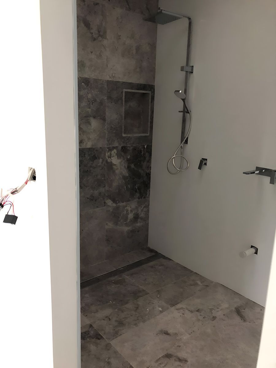 A Modern Bathroom Features a Large Walk-in Shower — Piscopo Kitchens Plus In Forster, NSW