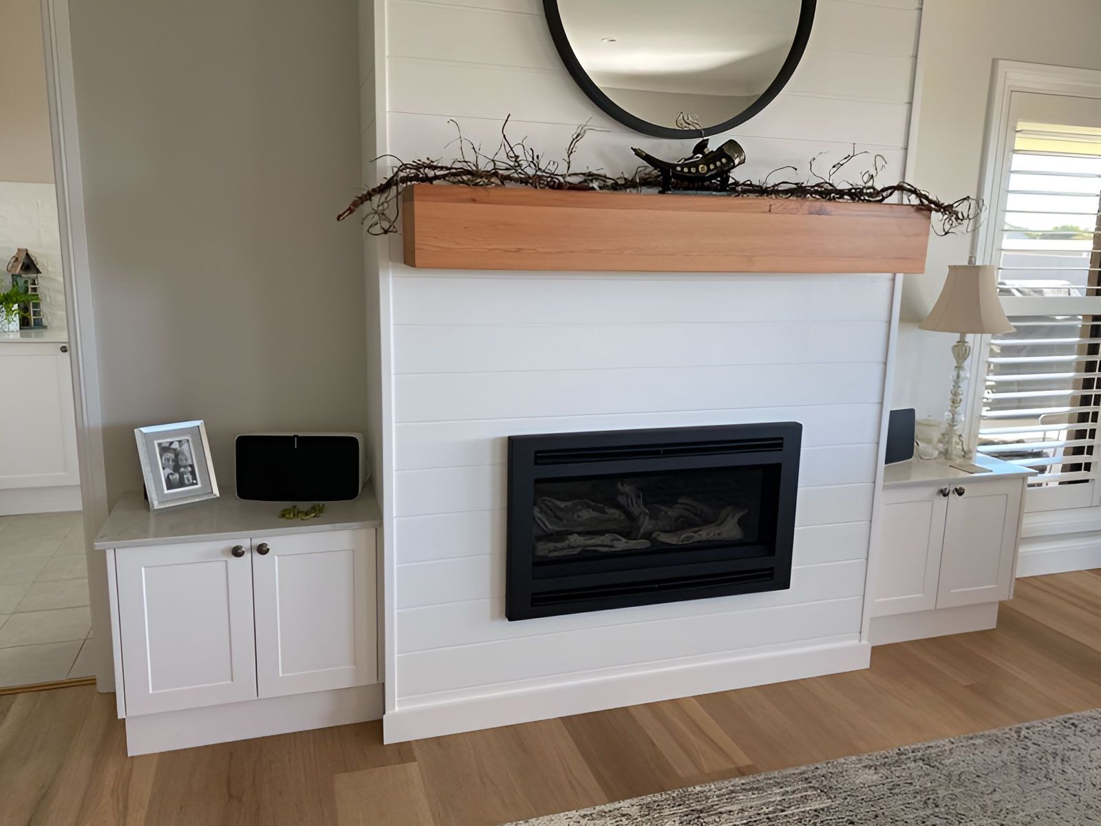 A Shiplap Fireplace With Cabinets on Each Side — Piscopo Kitchens Plus In Forster, NSW