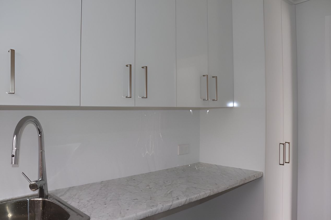 A Kitchen With Marble Countertop — Piscopo Kitchens Plus In Smiths Lake, NSW