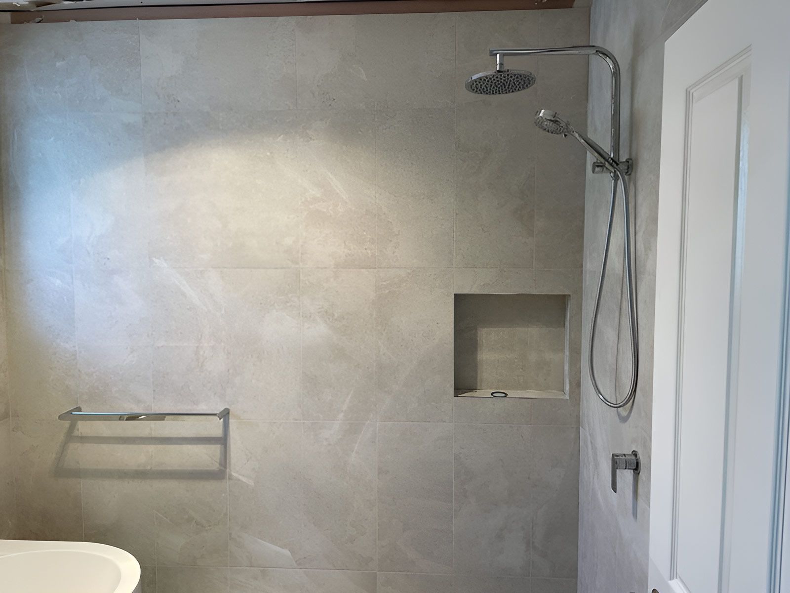 Bathroom With a Rainfall Showerhead and Handheld Sprayer — Piscopo Kitchens Plus In Taree, NSW