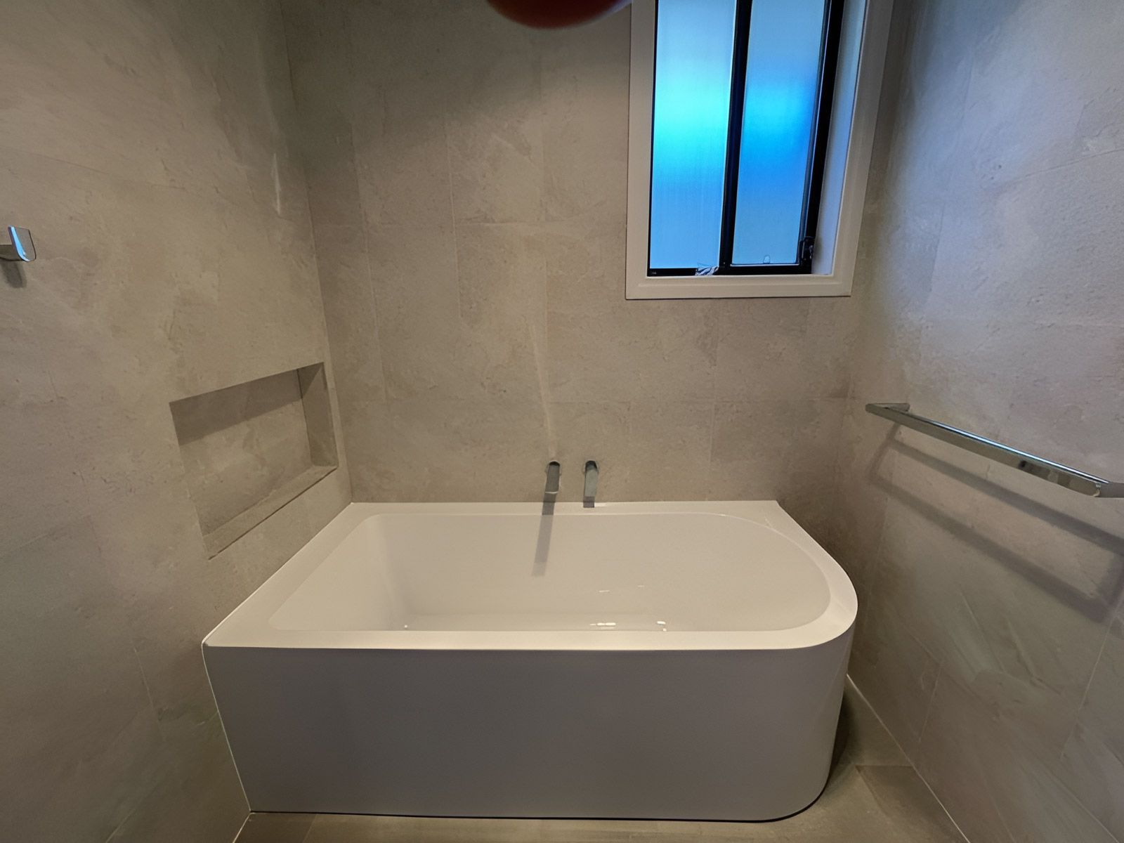 Bathroom With a White Rectangular Bathtub — Piscopo Kitchens Plus In Forster, NSW
