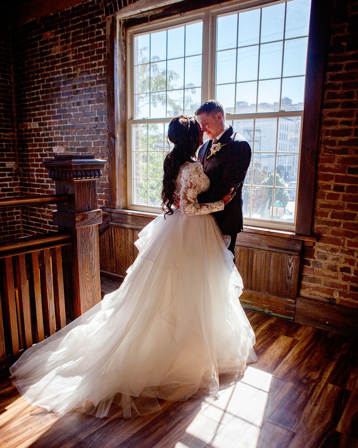 bride and groom embracing