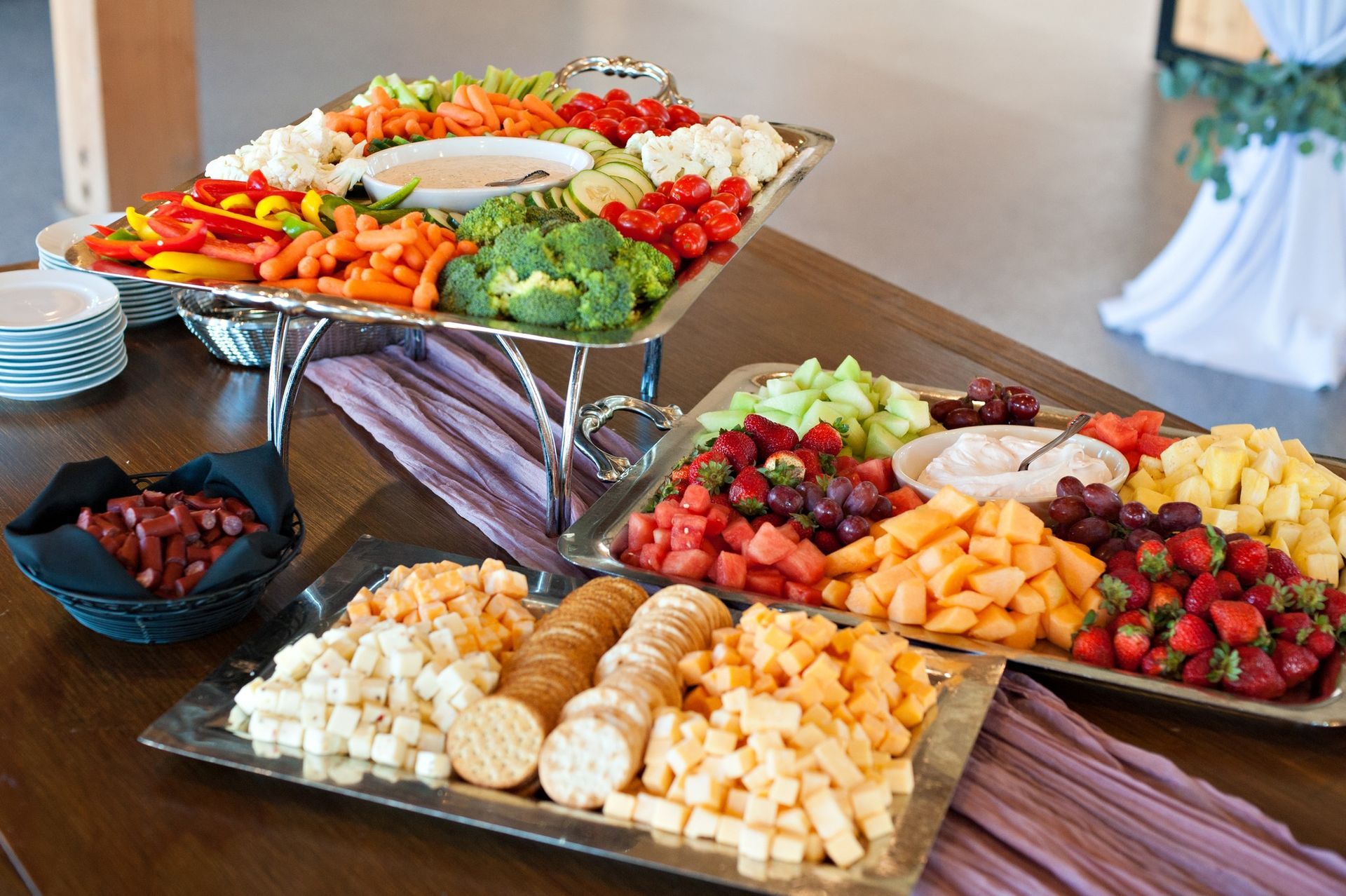 fruit, veggie and cheese trays at wedding