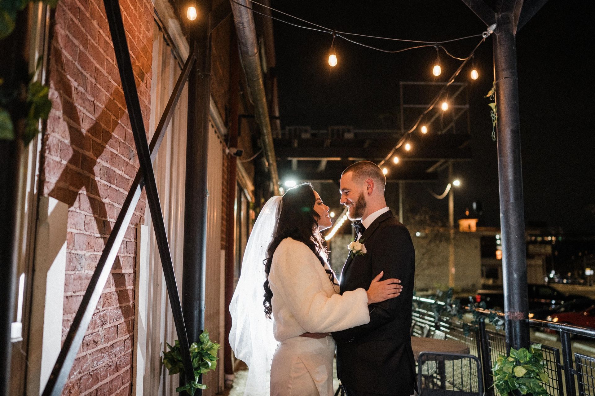 bride and groom embracing