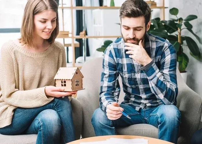 Texas homeowner reviewing tips to save money on home insurance