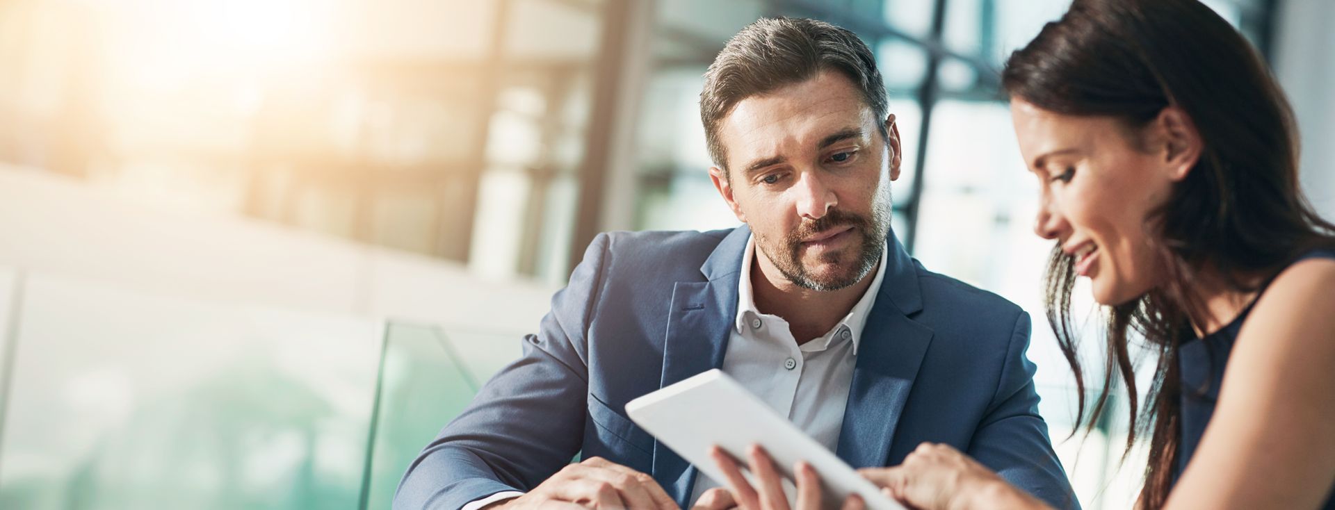 Family reviewing insurance savings with independent agent in North Texas