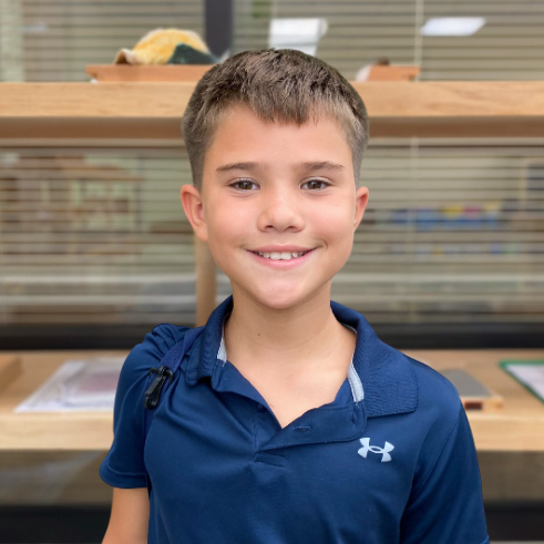 Child with Montessori materials