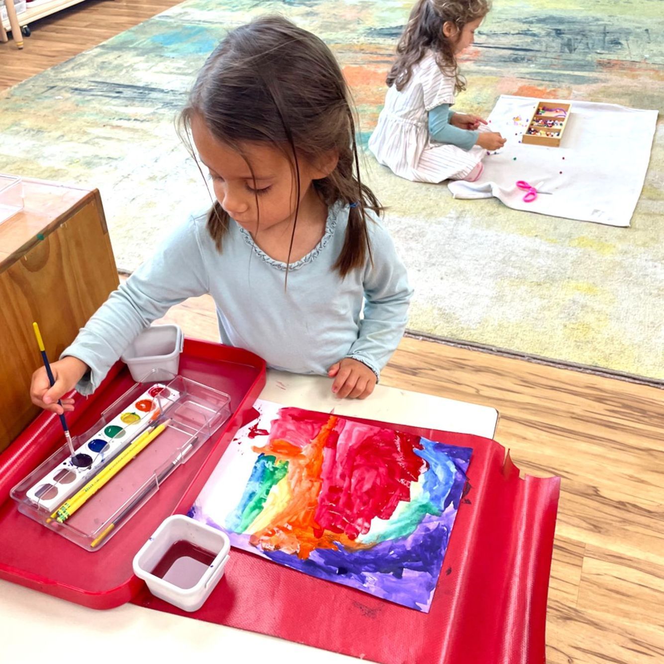 Montessori child painting