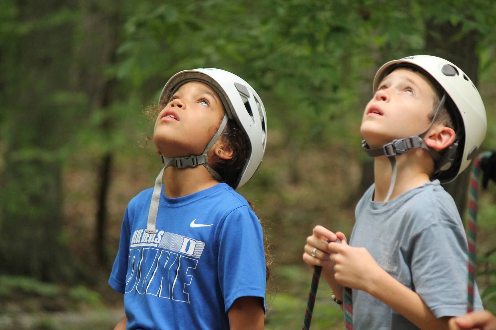 Montessori children wearing helmets