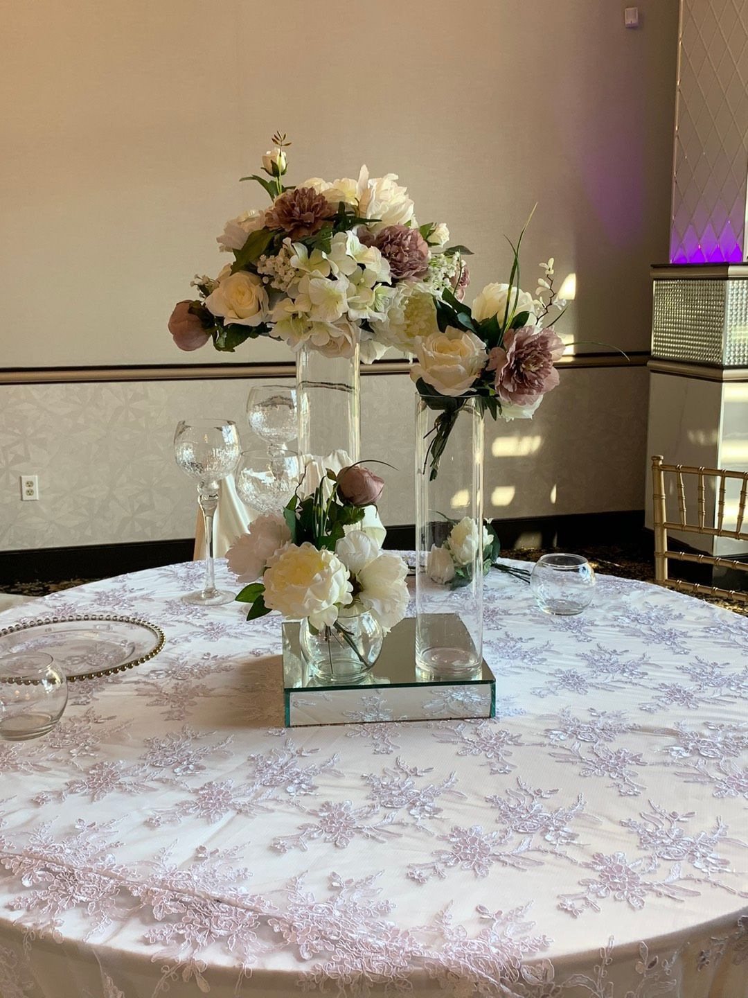 A Table with A Vase of Flowers — Mission, TX — Soiree