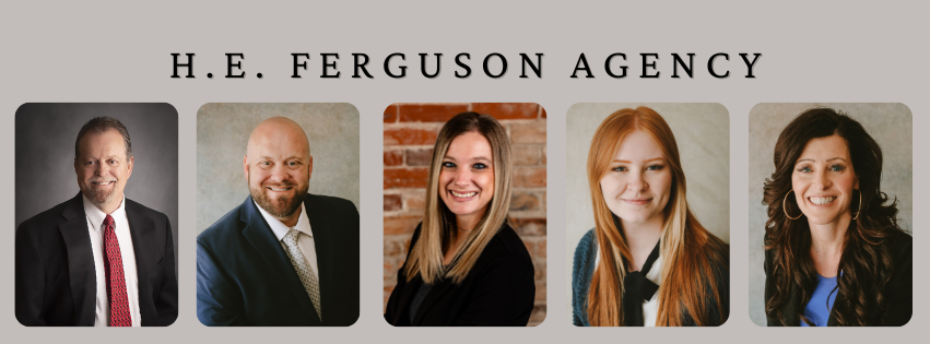 A group of Ferguson Agency team members are smiling.