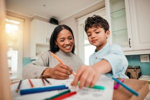 Parent guiding child’s learning with ABA strategies from Neuropath ABA